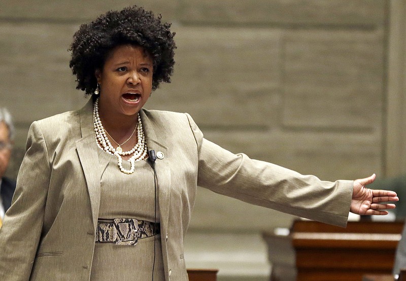 FILE - In this Sept. 10, 2014, file photo, Missouri state Sen. Maria Chappelle-Nadal speaks on the Senate floor in Jefferson City, Mo. Chappelle-Nadal says she posted and then deleted a comment on Facebook that said she hoped for President Donald Trump's assassination. The Democratic Senator says she didn't mean what she posted Thursday, Aug. 17, 2017, but was frustrated with the president's reaction to the violence last weekend in Charlottesville, Va.(AP Photo/Jeff Roberson, File)