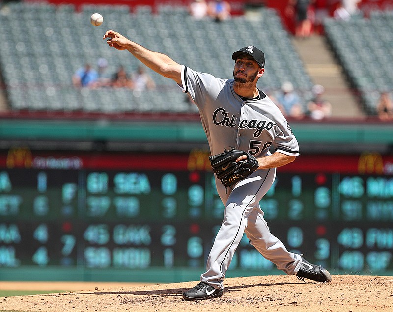 Chicago White Sox starting pitcher Miguel Gonzalez (58) delivers a pitch in the second inning against the Texas Rangers at Globe Life Park in Arlington, Texas, Sunday, Aug. 20, 2017. 