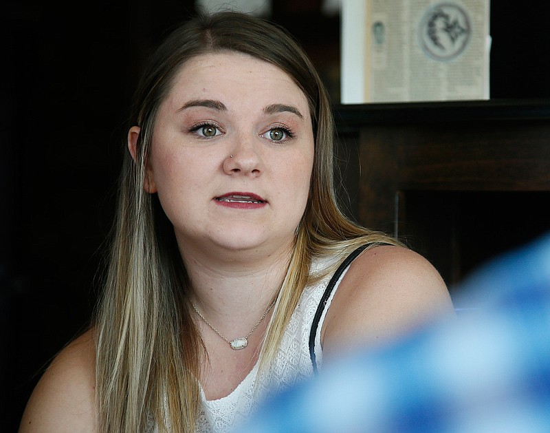 In this Wednesday, Aug. 9, 2017 photo, Danyelle Dyer talks during an interview in Edmond, Okla. Dyer had to obtain a court order after the man who molested her when she was 7 years old moved in next door. 