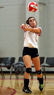 Maddie Layson of Calvary Lutheran makes a return during a home match last season.