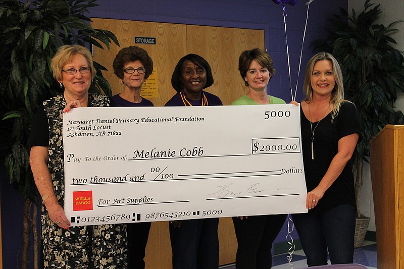 Ashdown High School Art Teacher Melanie Cobb received a $2,000 grant to purchase art supplies for her classroom. Pictured, from left, are Beth Provence, Katrina Williamson, Brenda Tate, Kari Harger and Melanie Cobb.