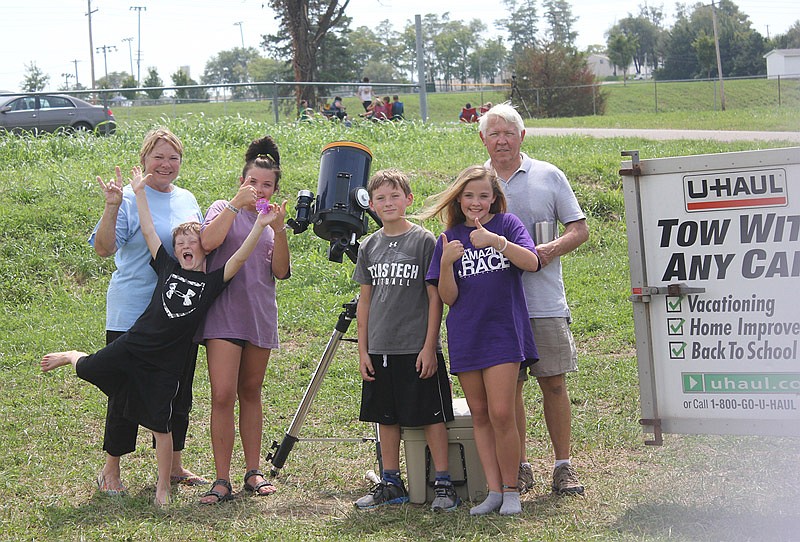 The Pato family from Aldeo, Texas, brought their telescope to view the total solar eclipse Aug. 21, 2017 in California, Mo.