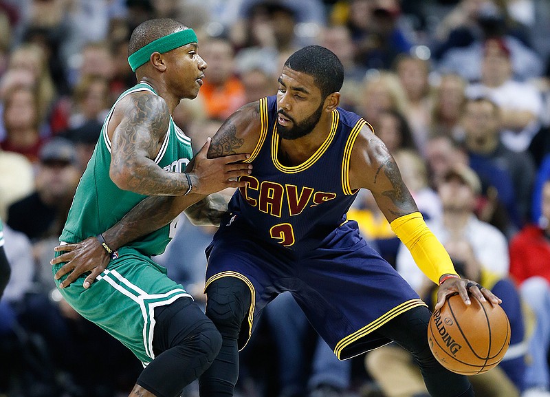 In this Nov. 3, 2016, file photo, Cleveland Cavaliers' Kyrie Irving, right, looks to drive against Boston Celtics' Isaiah Thomas during the first half of an NBA basketball game in Cleveland. Irving, who asked Cavaliers owner Dan Gilbert to trade him earlier this summer, could be on his way to Boston as the Cavaliers are in serious negotiations with the Celtics about swapping him for point guard Thomas. Since Irving made his stunning request, the defending Eastern Conference champions have been looking for a trade partner. They may have found the perfect one and could be nearing a deal with the Celtics, said the person who spoke Tuesday night, Aug. 22, 2017, to The Associated Press on condition of anonymity because of the sensitivity of the talks.