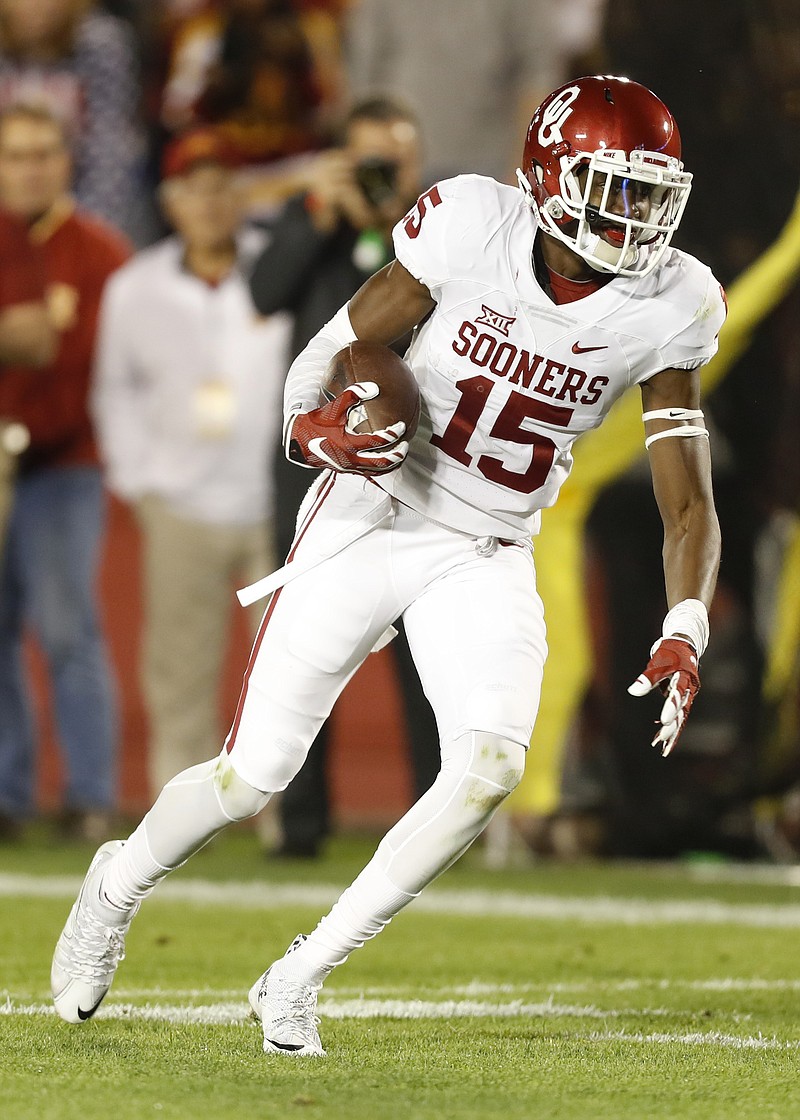 This Nov. 3, 2016, file photo shows Oklahoma wide receiver Jeffery Mead running up field after making a reception during the first half of an NCAA college football game against Iowa State in Ames, Iowa. For the second straight year, Oklahoma must replace a star receiver. And again, the Sooners feel they have the talent on the roster to get it done.