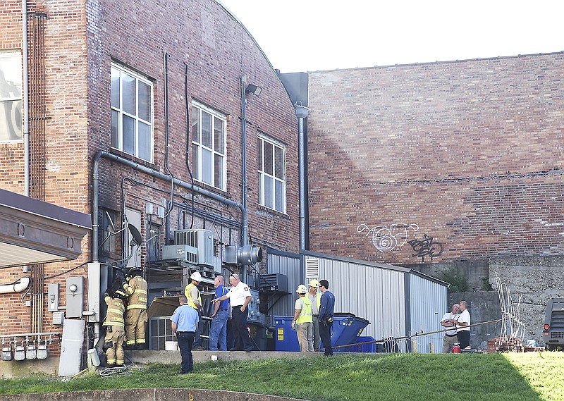 Smoke was still in the air Wednesday after an electrical fire in the rear of Arris' Pizza, 117 W. High St. Firefighters remained on the scene for more than an hour as electricians from Stokes Electric and Ameren worked to restore power.