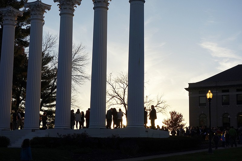 Students gather at the columns at Westminster College in Fulton. Westminster will partner with the Coalition Against Rape and Domestic Violence to provide a resource — in the form of an advocate — for victims of domestic violence, sexual assault, stalking and any other form of gender-based violence.