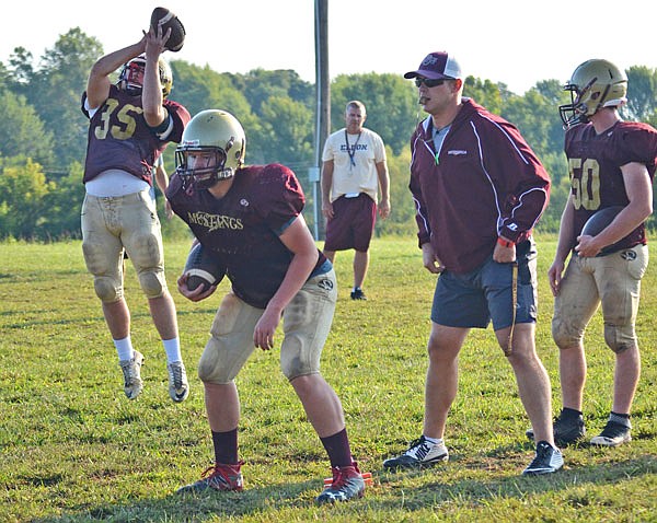 Eldon players work through a drill during practice earlier this month in Eldon. The Mustangs host Owensville tonight, playing the Dutchmen for the third time in their last 13 games dating back to Week 2 of the 2016 season.