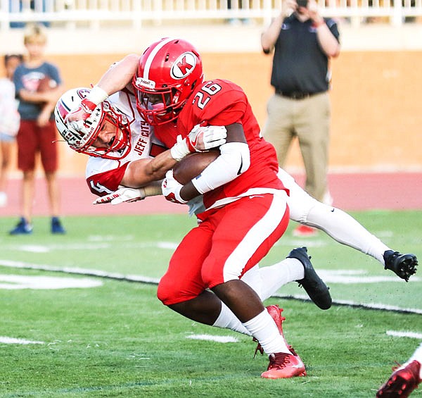 Jays safety Tyler Bise tries to tackle Kirkwood running back Martez Jones during Friday night's game in Kirkwood.