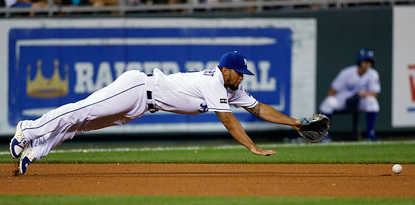 Royals third baseman Cheslor Cuthbert dives but is unable to reach a single by Wilson Ramos of the Rays during Wednesday night's game at Kauffman Stadium.