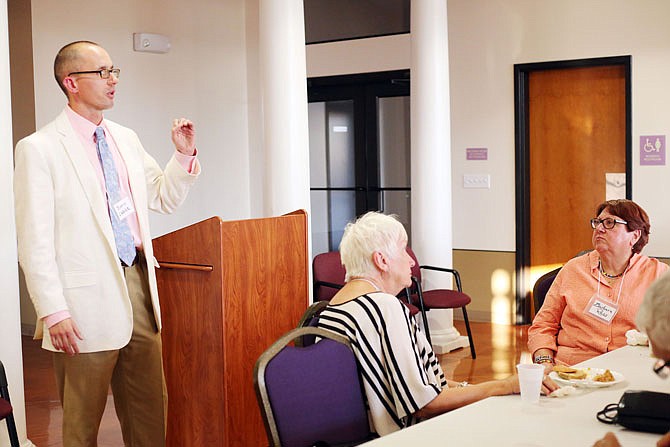 Justin Carver, head public defender in Cole County, speaks about racial injustice during jury selections Thursday at the annual "Empower Missouri" dinner at Quinn A.M.E. Chapel.