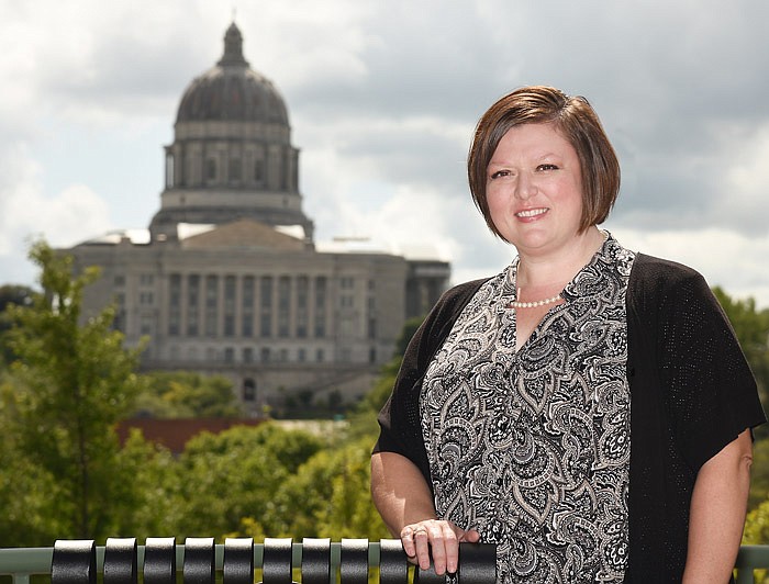 Brenda Sites poses at the Kirkpatrick State Office Building in Jefferson City. She leads the Missouri's Safe at Home program.