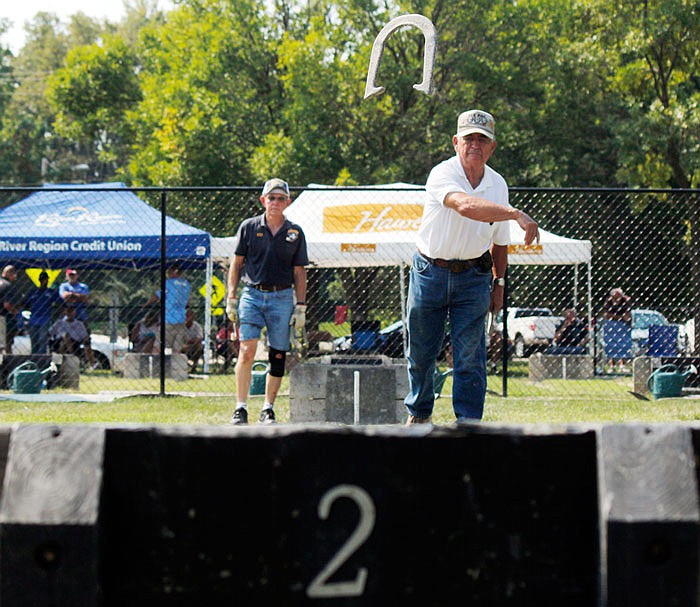 Edward Pashia pitches a horseshoe at his target pole during the Men's 30 Foot Championship as a part of the 2017 Missouri Horseshoe Pitchers Association State Championships at Washington Park on Monday. Pashia was ranked second in his group in pitching percentage with an average of 69.9 percent.