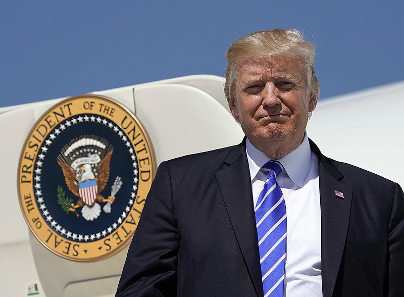 President Donald Trump during his arrival at Bismark Municipal Airport, Wednesday, Sept. 6, 2017 in Bismark, N.D. Trump is in North Dakota to promote his tax overhaul plan. (AP Photo/Pablo Martinez Monsivais)