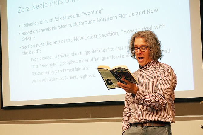 William Woods University English professor Matthew Dube leads a discussion Tuesday about haints and hauntings in African-American folklore. The event was part of One Read.