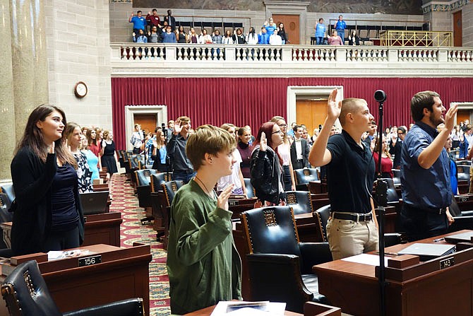 Fulton High School students swear to defend the Constitution during the 2017 Constitution Project kickoff Wednesday at the Capitol. Five FHS students attended, including Jessi Donze, far left, Sarah Hausen, Bryttney Pooler, Zach Frazee and Eric Lane.