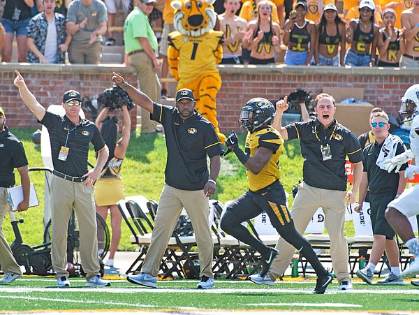 Missouri receiver Johnathon Johnson runs along the sideline as he scores during last Saturday's game against Missouri State at Faurot Field in Columbia.