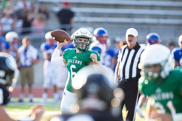 Blair Oaks quarterback Nolan Hair throws a pass during last month's Jamboree at the Falcon Athletic Complex. Hair suffered a hairline fracture in his lower right leg last Friday against Versailles and is expected to miss 6-8 weeks.