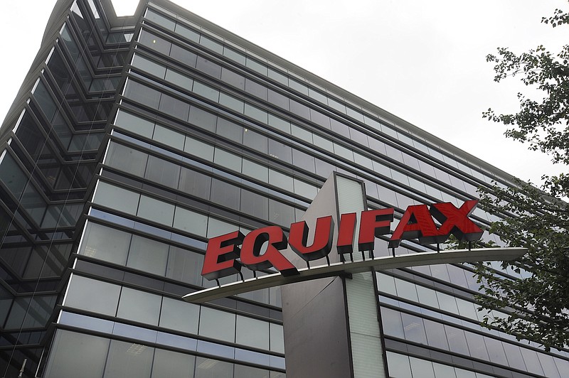 This July 21, 2012, photo shows Equifax Inc., offices in Atlanta, Ga. Credit monitoring company Equifax says a breach exposed social security numbers and other data from about 143 million Americans. The Atlanta-based company said Thursday, Sept. 7, 2017, that "criminals" exploited a U.S. website application to access files between mid-May and July of 2017.