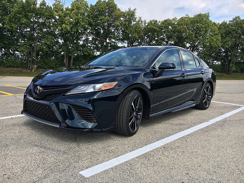 2018 Toyota Camry XSE features 19-inch black wheels standard, larger front air intakes, a split X-wing grille, and has a two-inch longer wheelbase and one-inch lower ride height for improved handling and sportier appearance. Pictured at Arlington Park Racetrack in Arlington Heights, Ill., on August 16, 2017.