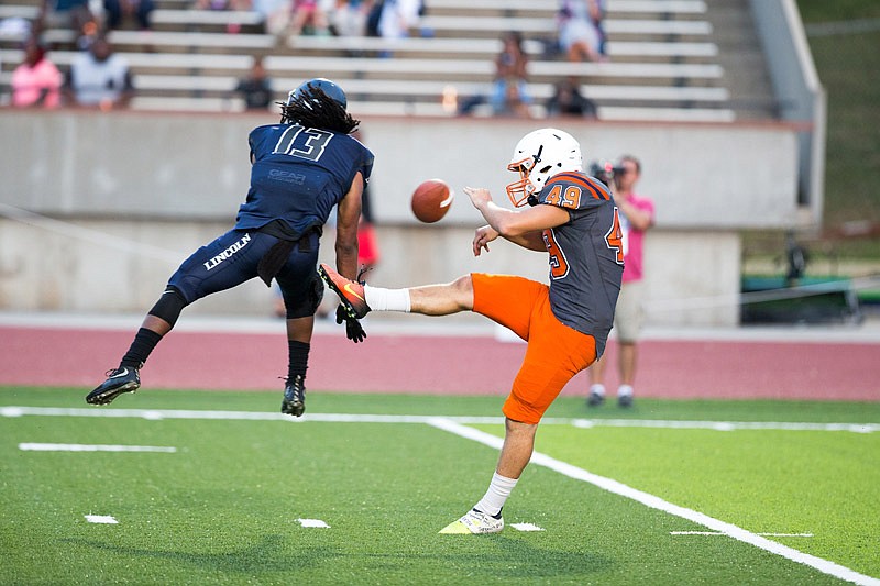 Phillip Kind of the Lincoln University Blue Tigers blocks a punt attempt by Lincoln (Pa.) during the second quarter of their game Saturday night, Sept. 9, 2017 at Dwight T. Reed Stadium in Jefferson City.