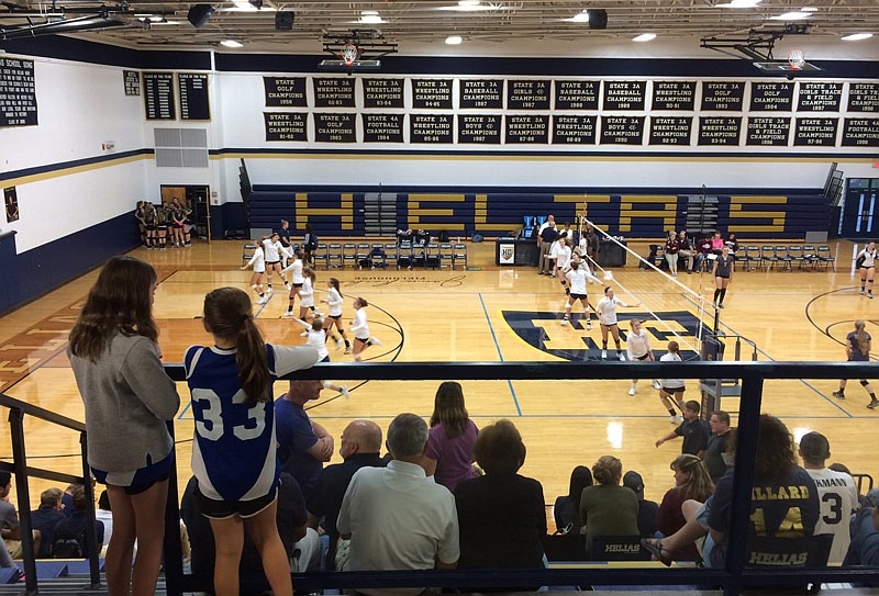 The two volleyball teams warm up Tuesday, Sept. 12, 2017 as the Helias Lady Crusaders host the Rolla Lady Bulldogs.
