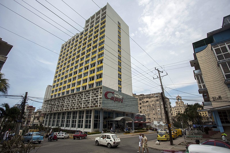 The Hotel Capri in Havana, Cuba, is photographed Tuesday, Sept. 12, 2017. New details about a string of mysterious “health attacks” on U.S. diplomats in Cuba indicate the incidents were narrowly confined within specific rooms or parts of rooms. Aside from their homes, officials said Americans were attacked in at least one hotel, the recently renovated Hotel Capri, steps from the Malecon, Havana’s iconic, waterside promenade.(AP Photo/Desmond Boylan)