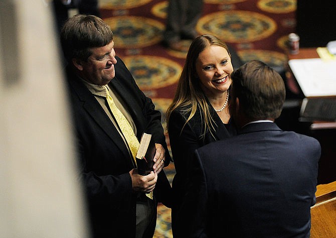 Rep. Sara Walsh, R-Ashland, smiles after taking the oath of office Wednesday in the Missouri House at the Capitol.