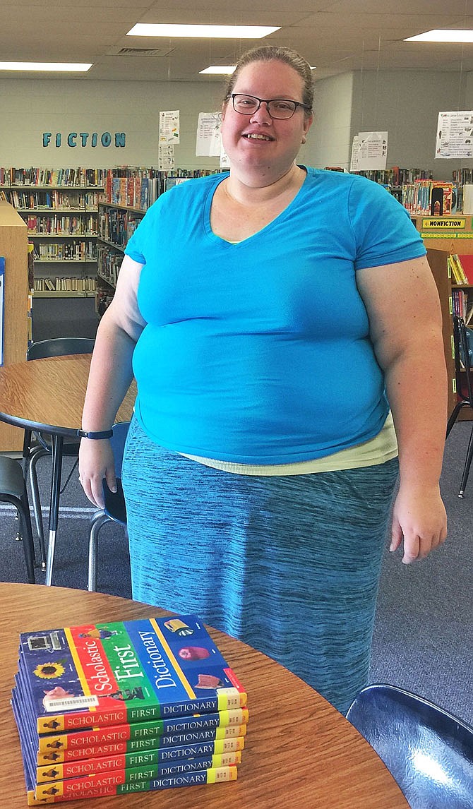 North Callaway school library aide Kathern David will assist patrons at Williamsburg Elementary.