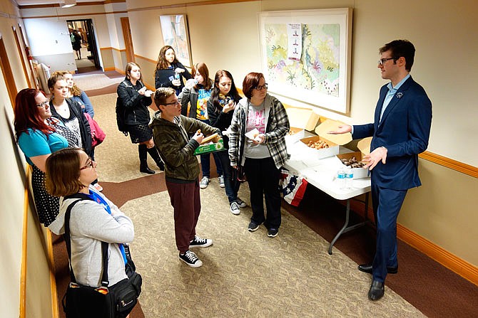 William Woods University history professor Craig Bruce Smith speaks with students following a lecture about George Washington last winter. His upcoming lecture about Benjamin Franklin at the University of Missouri will be taped by C-SPAN and aired at a later date.