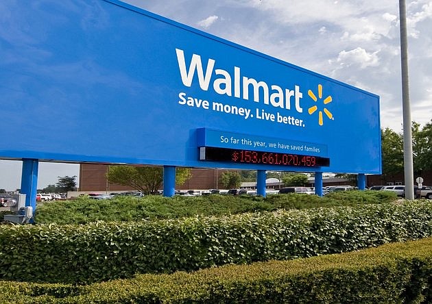 This undated file photo shows the sign for Wal-Mart's headquarters in Bentonville, Ark.