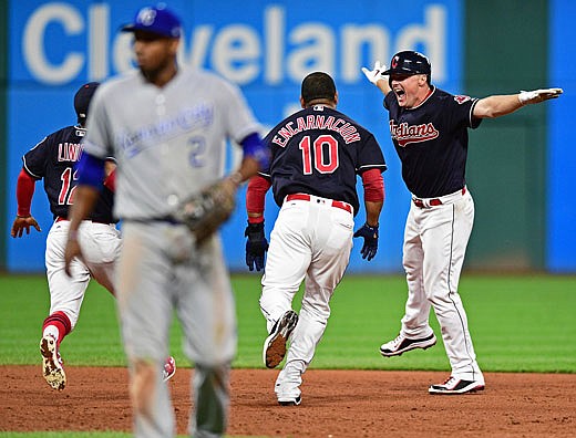 Jay Bruce celebrates his Indians teammates after driving in the game-winning run in the bottom of the 10th inning Thursday night against the Royals in Cleveland.