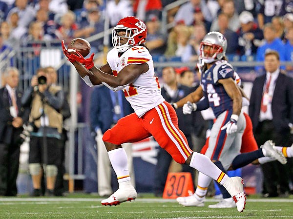 Chiefs running back Kareem Hunt catches a pass during last Thursday night's game against the Patriots in Foxborough, Mass. Hunt and several other rookies had success in Week 1.