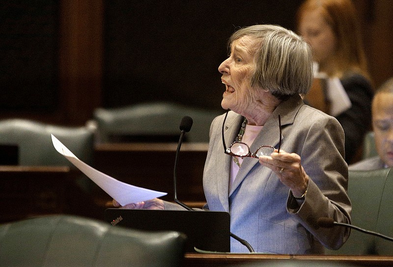 FILE -In this Dec. 2, 2015, file photo, Illinois state Rep. Barbara Flynn Currie, D-Chicago, speaks on the House floor at the Capitol in Springfield, Ill. More than two-dozen legislators, about 15 percent of the General Assembly, have either resigned months into the current session or said they won't seek re-election. House Majority Leader Currie said that she's ending her nearly 40-year legislative career when her term expires. (AP Photo/Seth Perlman, File)