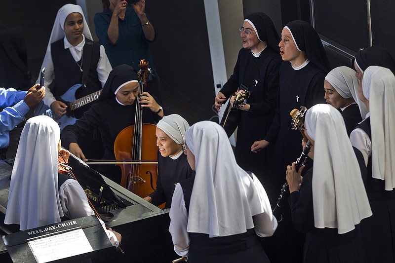 <p>AP</p><p>Members of “Siervas,” a Peruvian-based rock ‘n’ roll band comprised entirely of Catholic nuns rehearse a day ahead of their performance at the Christ Cathedral campus in Garden Grove, California. The sisters insist they aren’t rock stars though they’re being considered for a nomination for a Latin Grammy and their concerts draw thousands.</p>