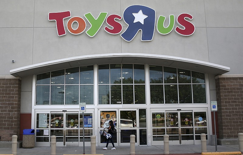 A customer walks into a Toys R Us store in Dallas, Tuesday, Sept. 19, 2017. Toys R Us has filed for Chapter 11 bankruptcy protection while continuing with normal business operations. (AP Photo/LM Otero)