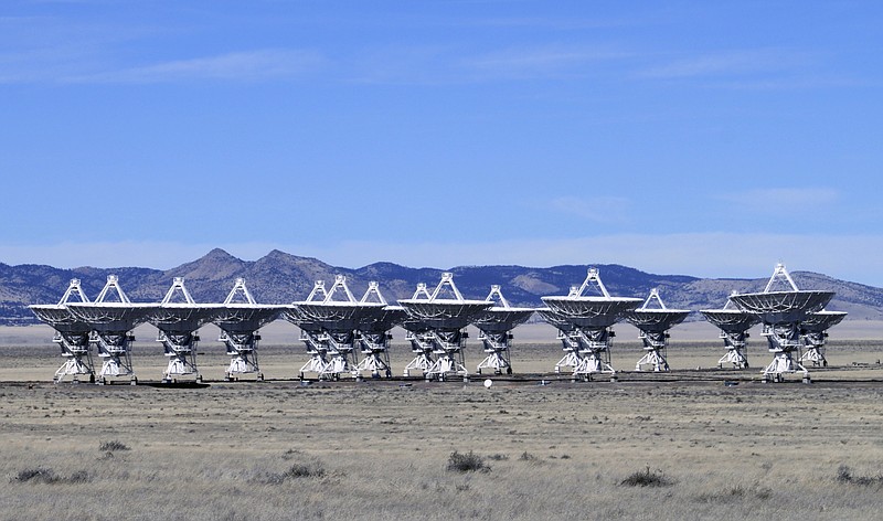 This Feb. 10, 2017 photo shows radio antennas that make up the Very Large Array astronomical observatory are positioned on tracks on the Plains of San Augustin west of Socorro, N.M. The Very Large Array is being used to make what astronomers say will be the sharpest radio image of a large swath of the sky as part of a 7-year project. (AP Photo/Susan Montoya Bryan)