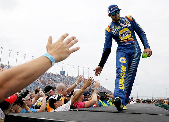 Chase Elliott greets fans before Sunday's race at Chicagoland Speedway in Joliet, Ill.