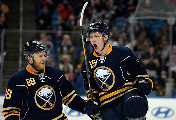At age 20, Sabres center Jack Eichel (right) is among the players with something to prove during upcoming NHL season.