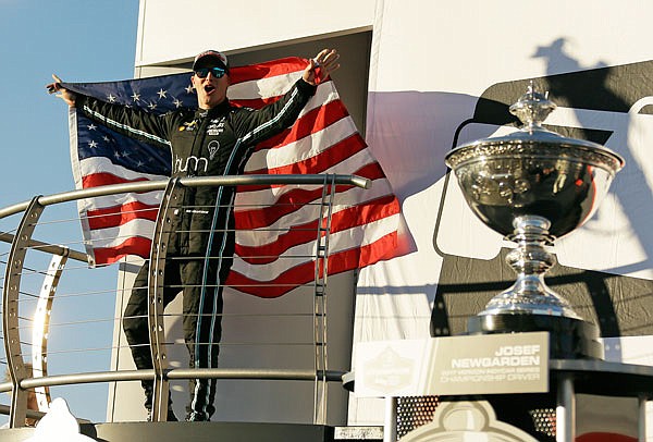 Josef Newgarden celebrates after winning the IndyCar championship Sunday, in Sonoma, Calif. 