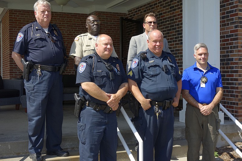 <p>Jenny Gray/For the News Tribune</p><p>Former recipients of the G.W. Law Enforcement Officer of the Year announcement, designated annually by members of the Fulton Rotary Club, include (from left, front) Lt. Bill Ladwig and Sgt. Joe Schramm of Fulton P/D, and Sgt. Jeff Harding of the Callaway County Sheriff’s Office, and (back row) Major Roger Rice of Fulton P/D, Callaway County Sheriff’s Deputy Fred Cave, and Investigator Bob Smith of the Callaway Prosecutors Office. Other recipients were not able to make it to Wednesday’s event.</p>