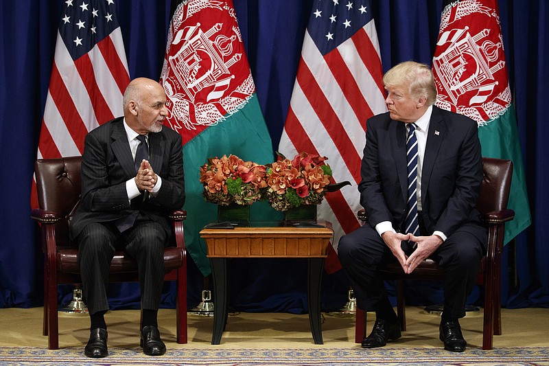 President Donald Trump meets with Afghan President Ashraf Ghani at the Palace Hotel during the United Nations General Assembly, Thursday, Sept. 21, 2017, in New York. (AP Photo/Evan Vucci)