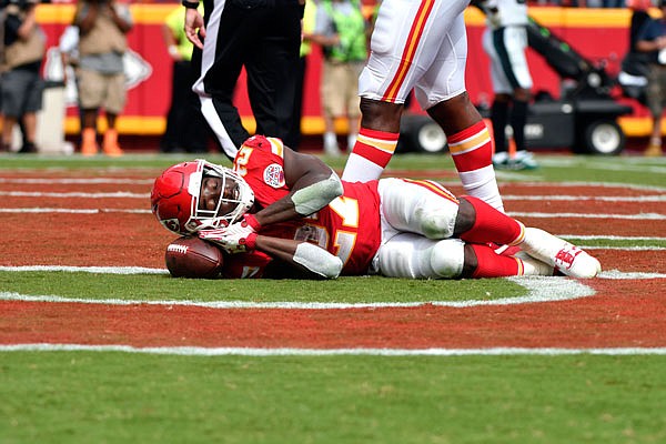 Chiefs running back Kareem Hunt pretends to sleep on the ball as he celebrates a touchdown during last Sunday's game against the Eagles at Arrowhead Stadium Kansas City.