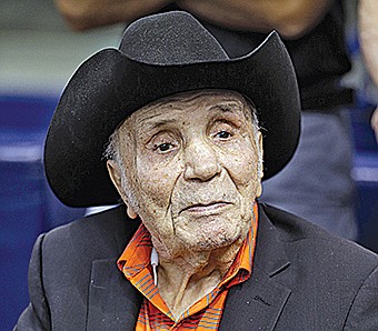 In this Sept. 15, 2015, file photo, Jake LaMotta watches batting practice before a baseball game between the Tampa Bay Rays and the New York Yankees, in St. Petersburg, Fla. LaMotta, whose life was depicted in the film "Raging Bull," died Tuesday, Sept. 19, 2017, at a Miami-area hospital from complications of pneumonia. He was 95. 