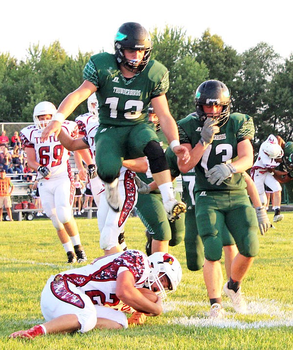 North Callaway junior inside linebacker Jordan Delashmutt leaps over a Tipton ball carrier during the Thunderbirds' 47-0 rout of the Cardinals last month in Kingdom City. State-ranked North Callaway squares off against Wright City in a conference matchup tonight for Homecoming.