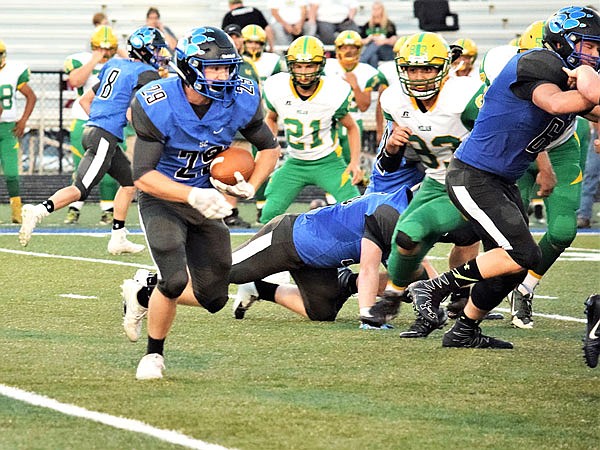 South Callaway senior running back Dalton Stone looks for an opening on the perimeter during the Bulldogs' 55-7 win against Milan last month in Mokane.