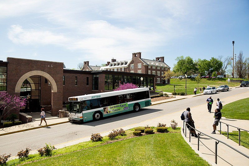 In this April 24, 2014 file photo, a Jefftran city bus sits outside the Scruggs University Center on the Lincoln University campus.