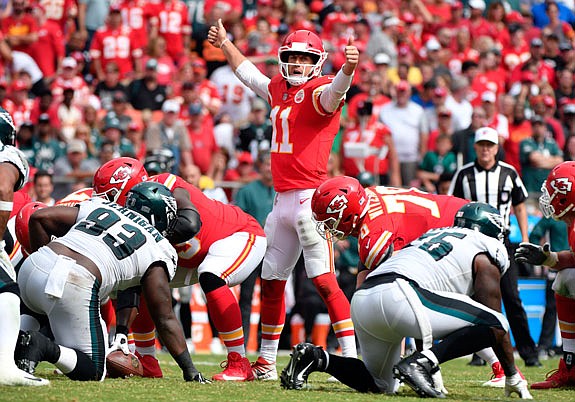 Chiefs quarterback Alex Smith calls instructions during the second half of Sunday afternoon's game against the Eagles at Arrowhead Stadium.