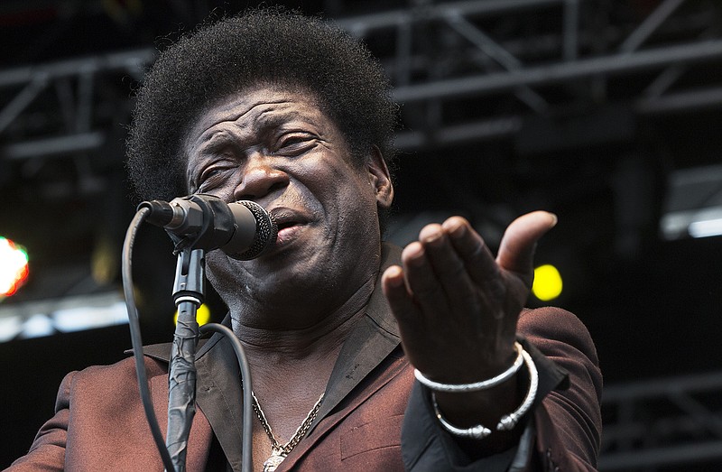 In this May 9, 2014 file photo, soul singer Charles Bradley performs at the Shaky Knees Music Festival in Atlanta, Ga. His publicist said Bradley died Saturday, Sept. 23, 2017 after a battle with stomach cancer. He was 68.