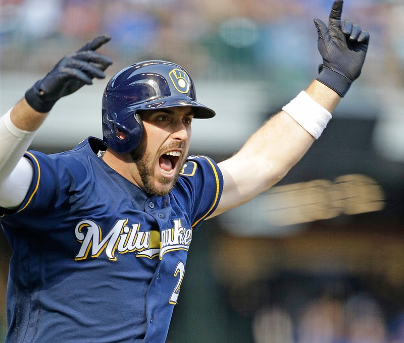 Milwaukee Brewers' Travis Shaw reacts after his two-run game winning home run against the Chicago Cubs during the 10th inning of a baseball game Saturday, Sept. 23, 2017, in Milwaukee. The Brewers won 4-3 in 10 innings.