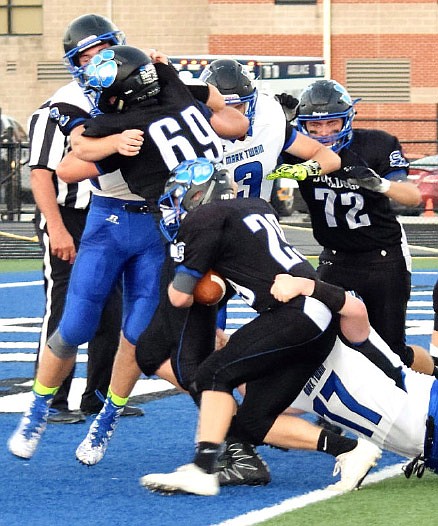 South Callaway senior tailback Dalton Stone scores on a 2-yard touchdown run in the first quarter of the No. 10 Bulldogs' 49-13 EMO rout of the Mark Twain Tigers on Friday night, Sept. 22, 2017 in Mokane.